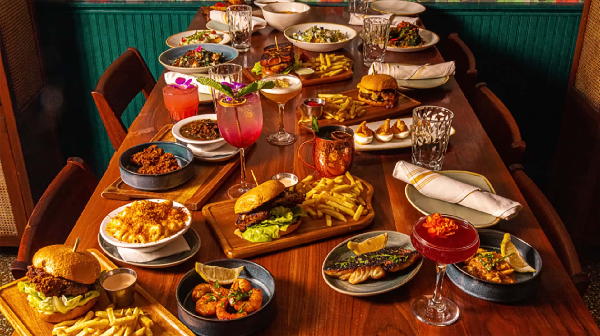 large table with multiple food items