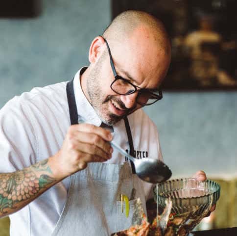 chef assembling food