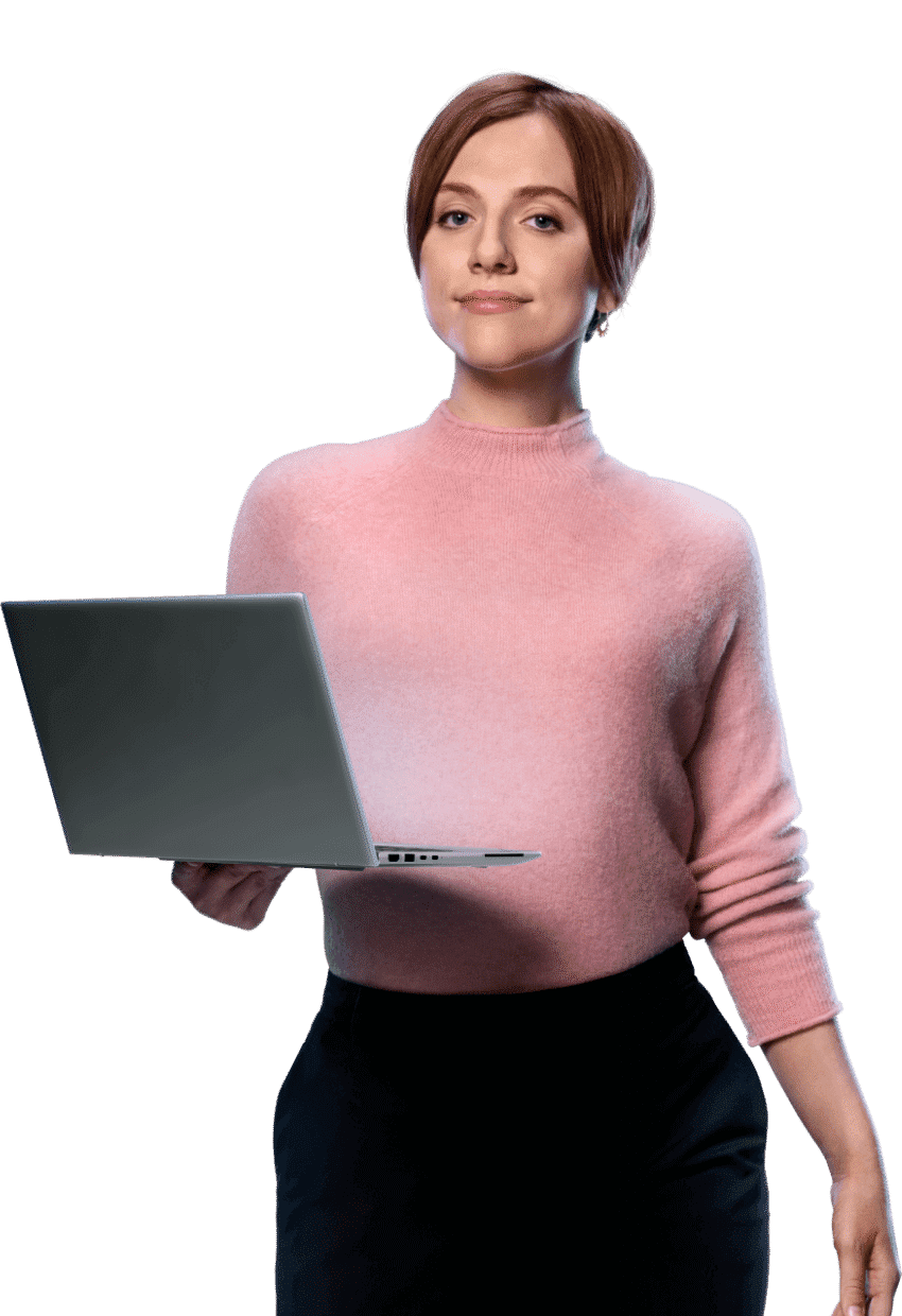 IT professional carrying an open laptop