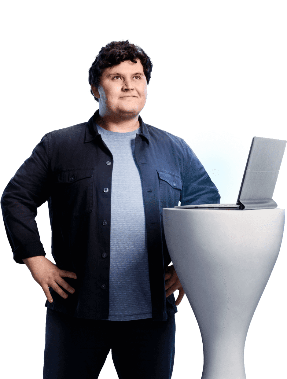 IT  professional looking at open laptop on a stand