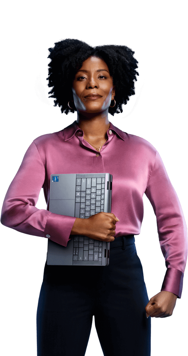 IT professional carrying closed laptop