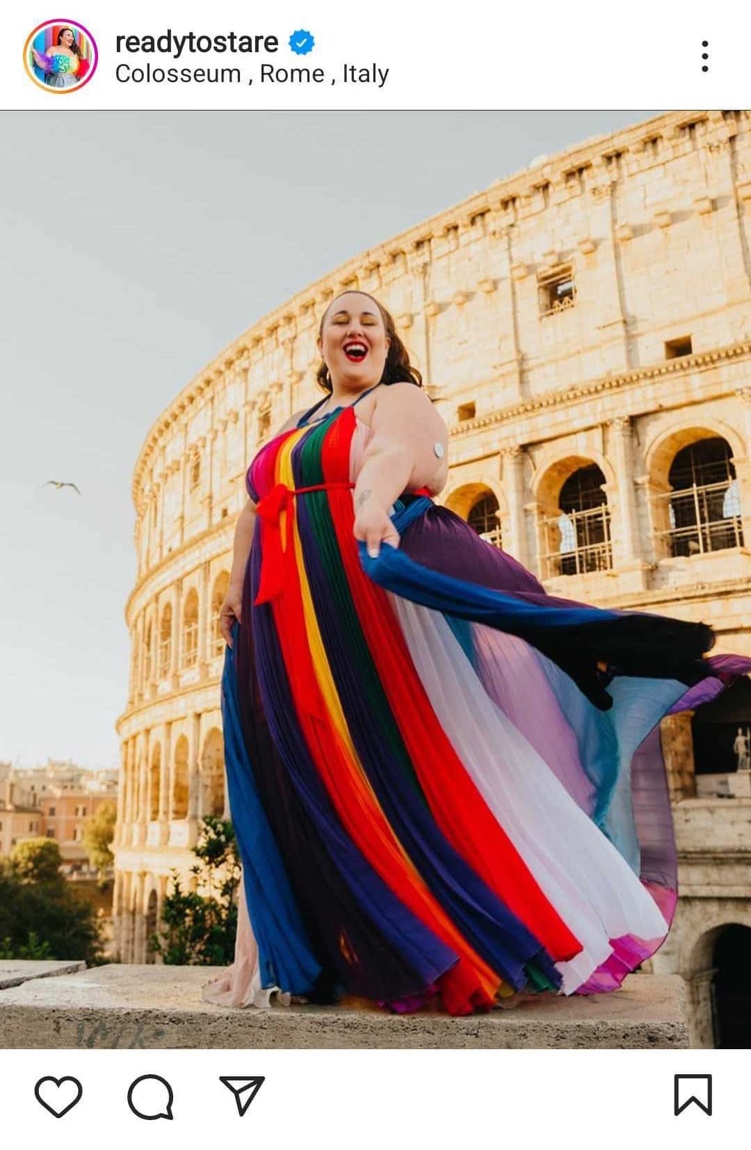 Alysse models a flowing rainbow-striped dress outside the Colosseum in Rome.