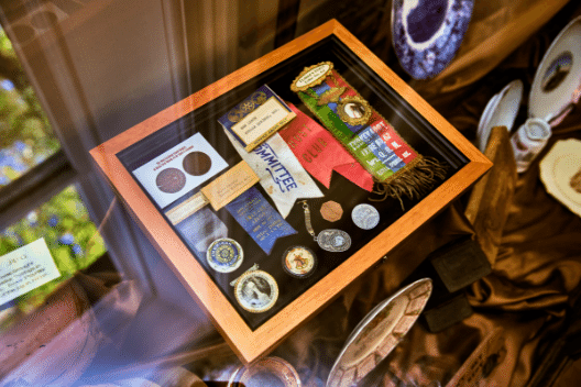 A display of old medals, coins and crockery at the museum.