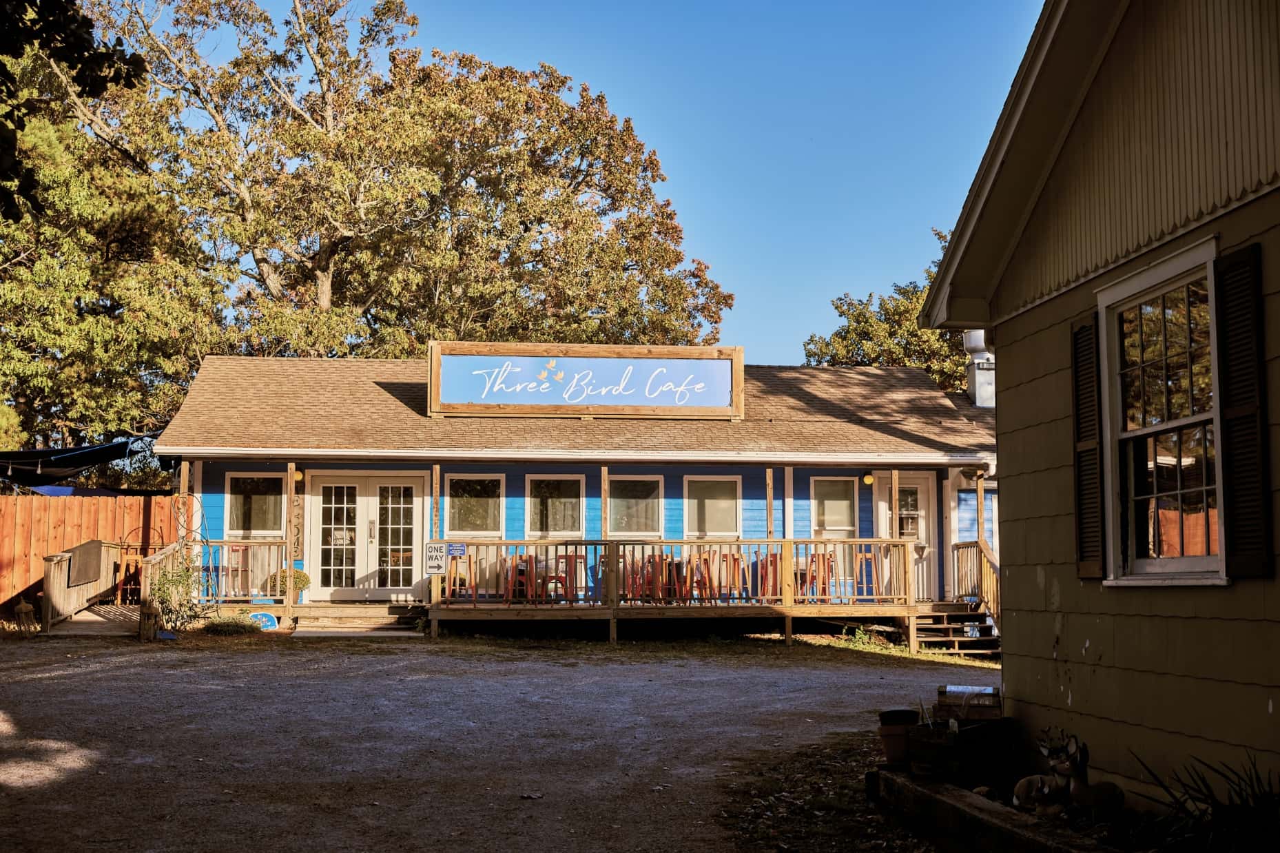 The sky-blue-painted clapboard exterior of Three Bird Café.