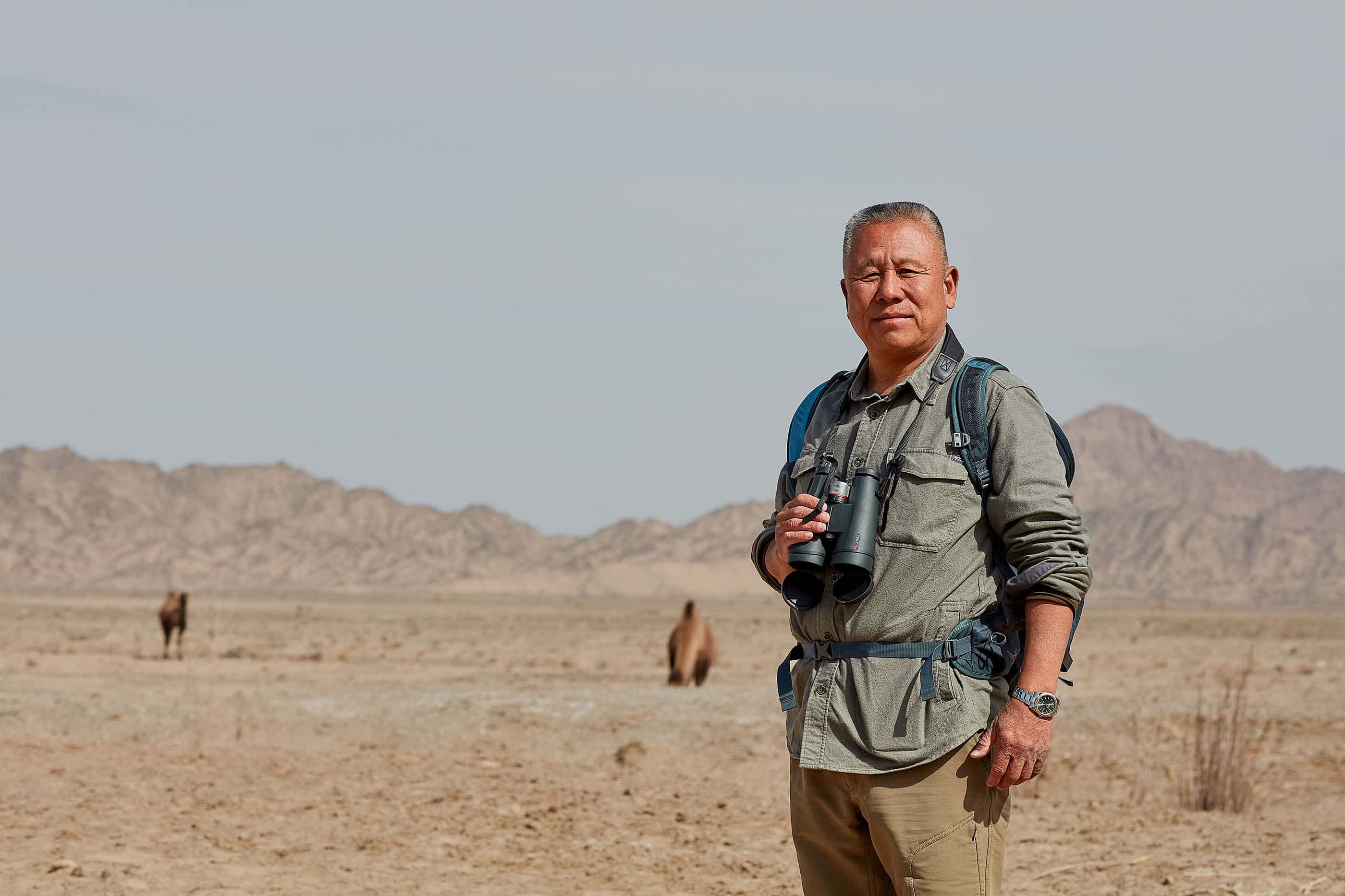 Chinese satellite expert Liu Shaochuang, standing in the Gobi Desert.