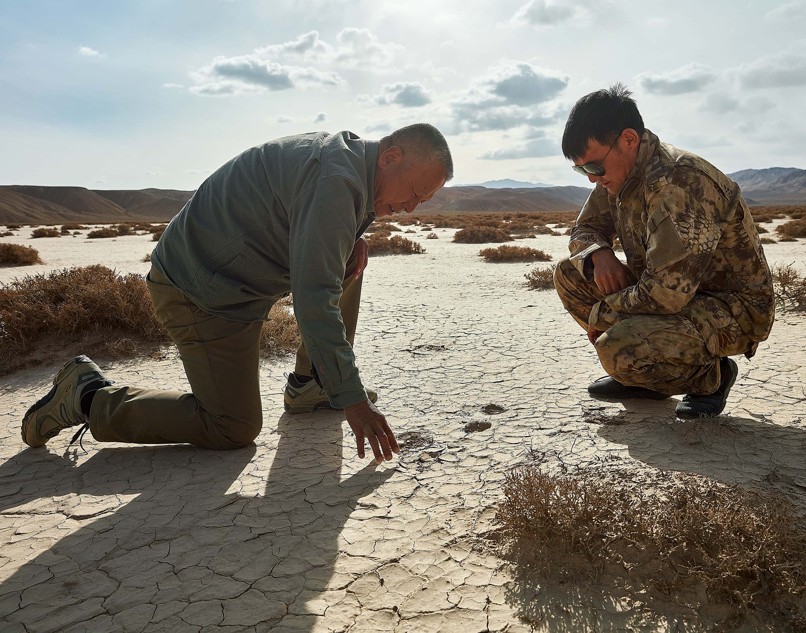 Chinese satellite expert Liu Shaochuang, standing in the Gobi Desert.