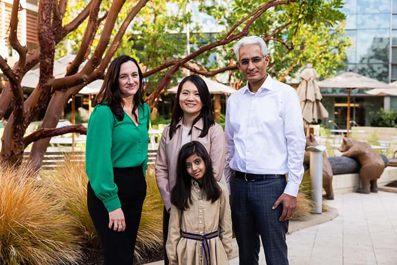 Drs. Kameny, Si and Bishnoi with Leen under a tree