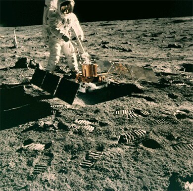 Buzz Aldrin pictured with the assembled seismic experiment on the moon. Image credit: NASA.