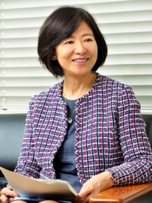 Headshot of OKINA Yuri, Chairperson, Japan Research Institute