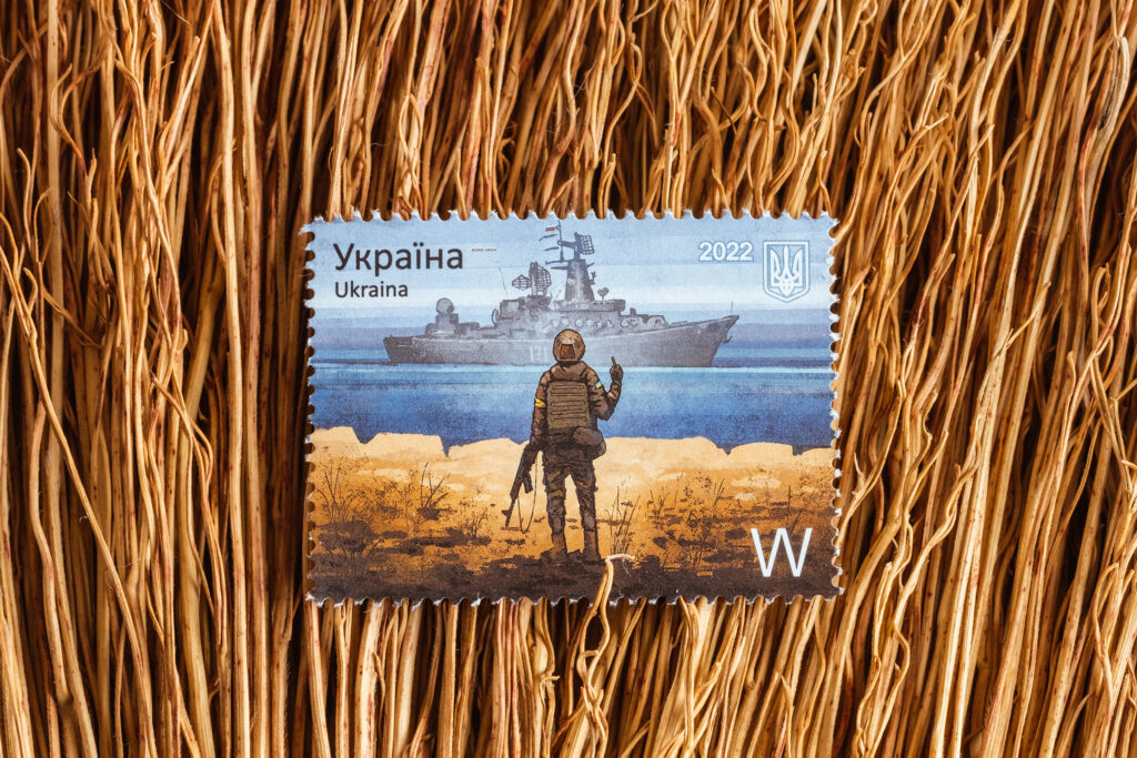 A stamp with a picture of a soldier on it.