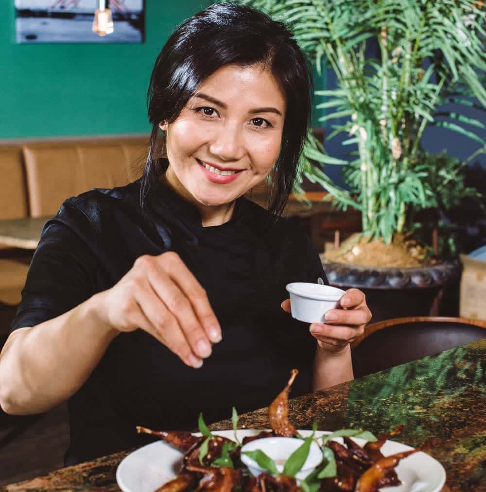 sprinkling salt on top of food