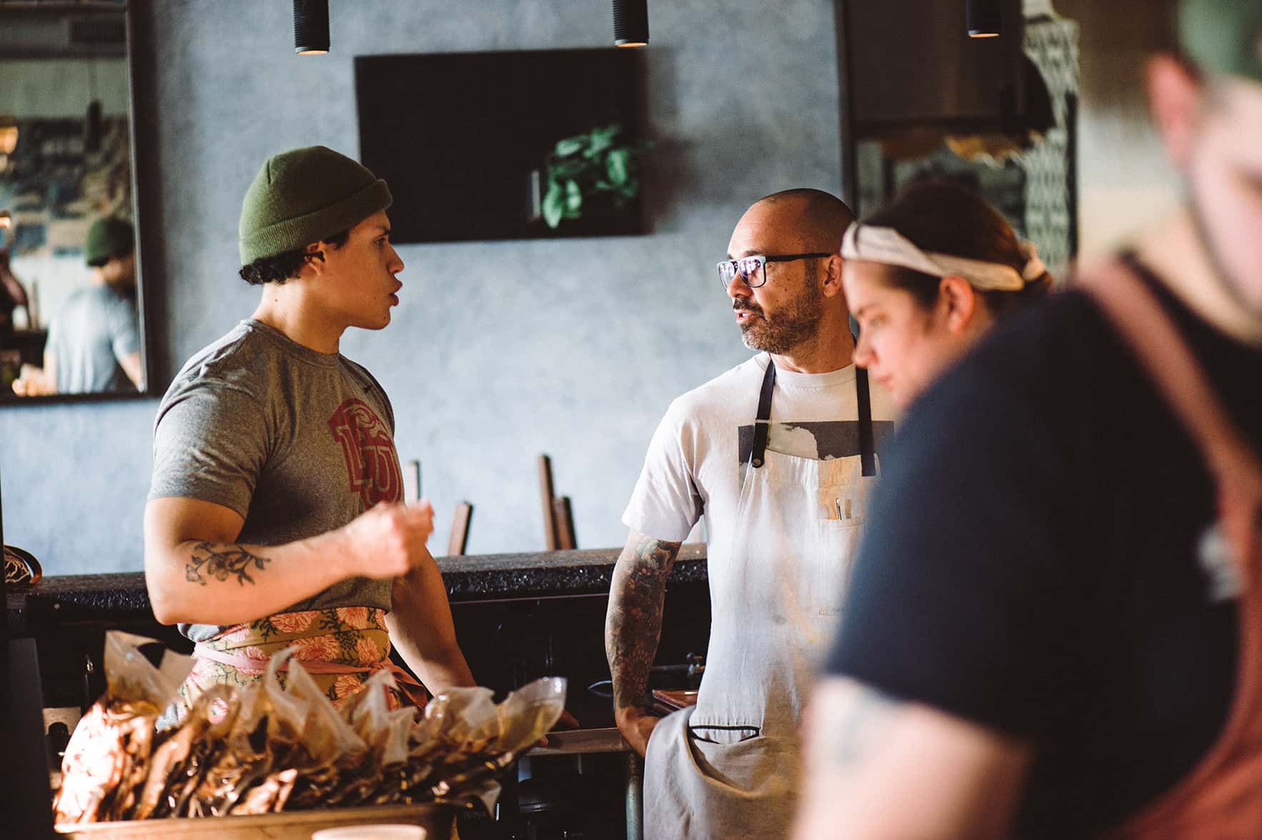 restaurant staff talking to each other